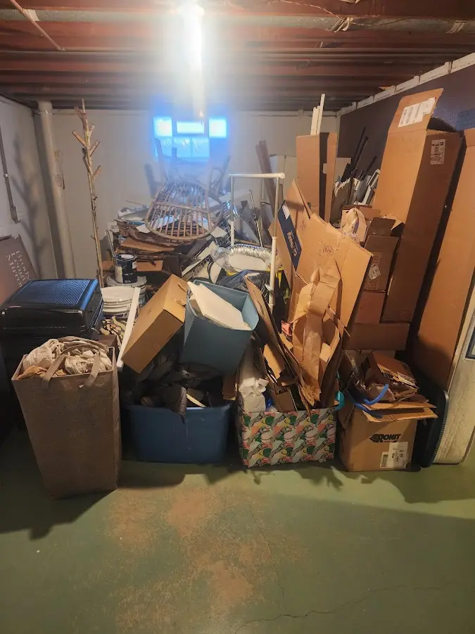 Roll-off dumpster container at job site for 8 Yard Dumpster Rental in Woodstock